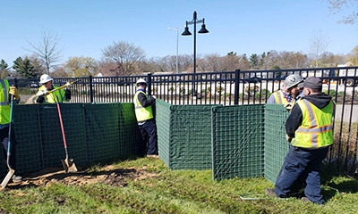 Line the Barriers with Geotextile Fabric